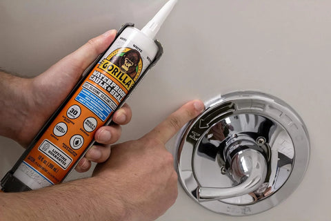 Gorilla White 100 Percent Silcone Sealant Caulk and Newborn 189D Drip Free Caulking Gun