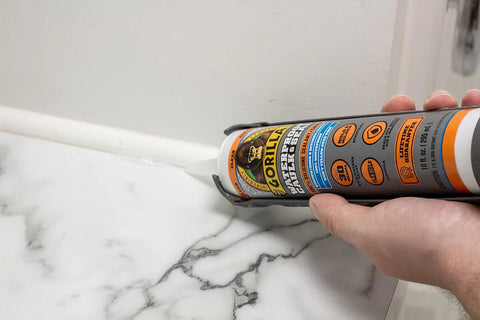 Gorilla Clear 100 Percent Silicone Sealant Caulk and Newborn 189D Drip Free Caulking Gun